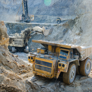 mining with excavator and large cump truck